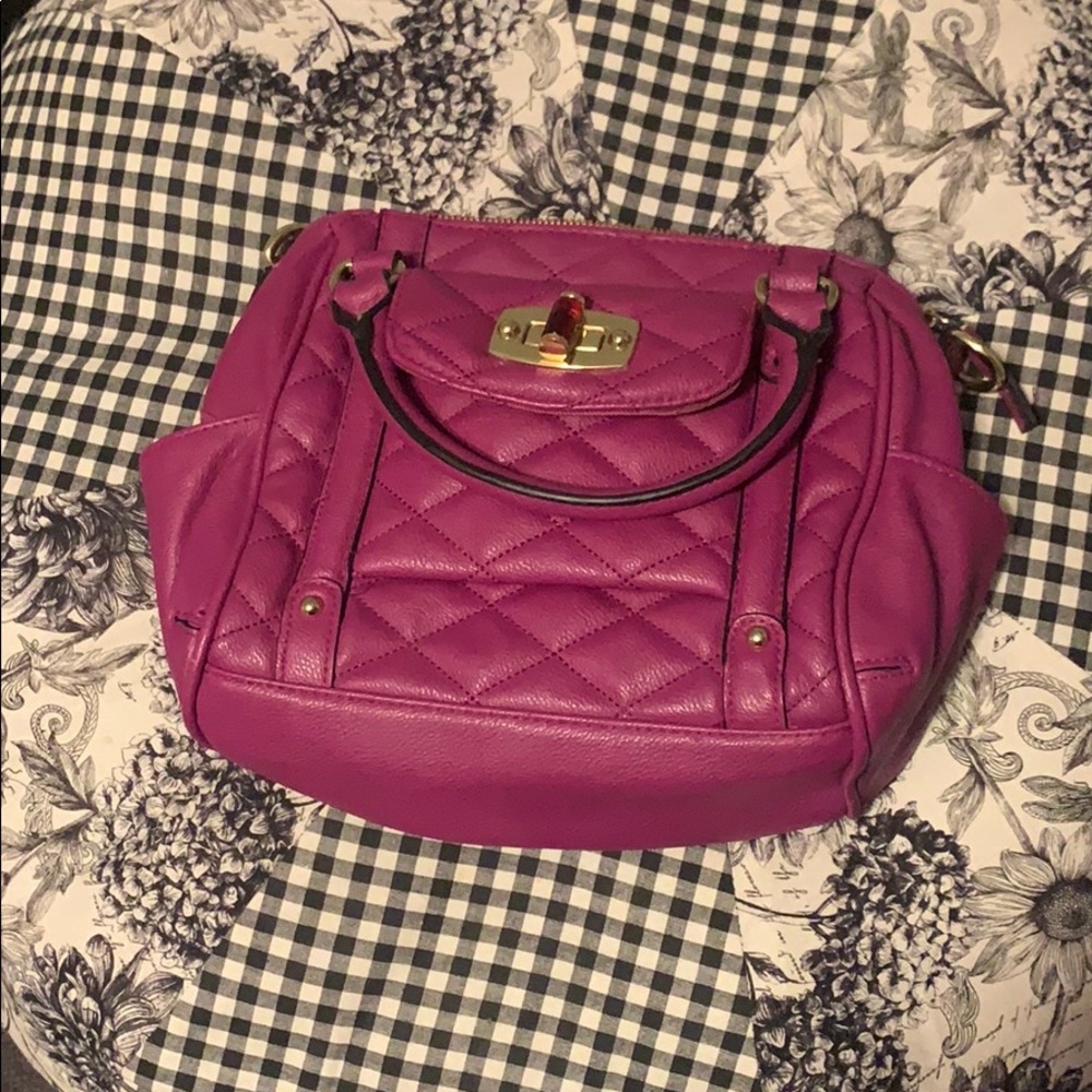 Medium sized purple hand bag